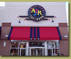 Red is a popular color choice for restaurant awnings, and bright colors can lure customers inside!